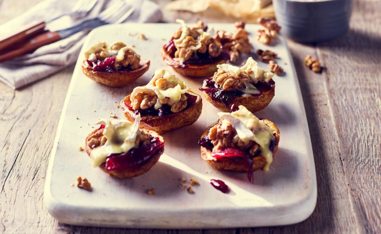 Baked Potato Skins with melted brie, red onion marmalade & walnuts